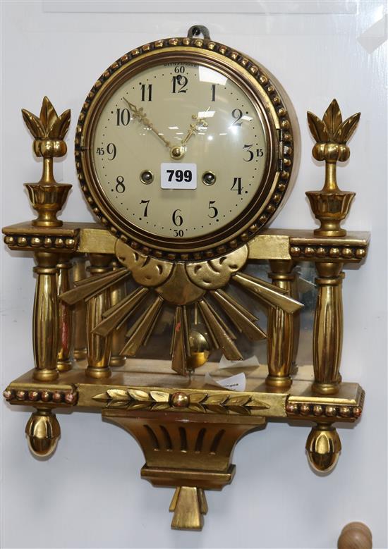 A Swedish giltwood cartel clock W.33cm